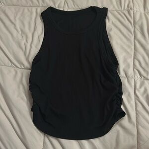 Woman’s black tank top